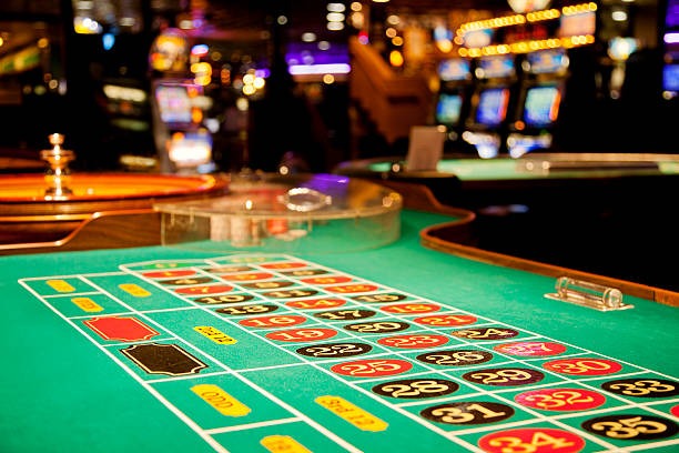 Live blackjack table with dealer and player cards