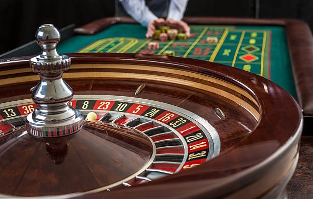 Roulette wheel spinning with betting layout